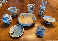 Group shot of all eight lusterware items on table