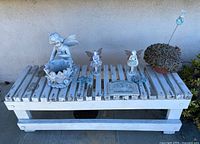 full view of bench with all decor items