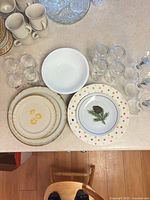 Overview of all dishes: plates, bowls, tumblers, wine glasses, mugs