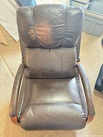 Front top view of leather recliner showing seat, backrest, arms