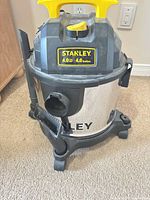 Stanley 4 HP 4 gal stainless wet/dry vacuum on casters