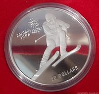 Obverse of 1988 Calgary Olympics $20 coin showing skier design and denomination