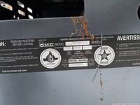 model information decal on grill frame