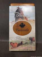 Outer illustrated sleeve showing Sable Island Horse graphics