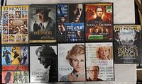 Front covers of all nine DVD cases showing titles