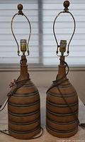 Front view of both matching table lamps showing overall design and condition