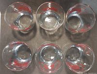 Top view of six identical lowball glasses