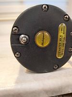 Side plate with model label and bearings info