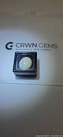 Opal in plastic gem display box on CRWN Gems card