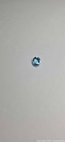 Top view of oval Swiss blue topaz loose gemstone