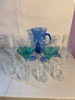 Full set showing pitcher, martini, wine and rocks glasses
