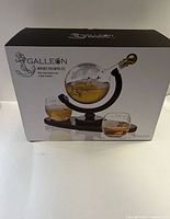 Retail box front showing globe decanter set