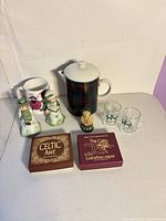 All items grouped: plaid pitcher, mug, two Irish figurines, Scottie dog bell, two shot glasses, two coaster boxes