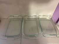 Three rectangular clear glass baking dishes side by side