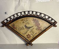 Front view of entire fan-shaped bamboo framed wall art