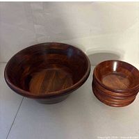 Large and small wooden salad bowls grouped together