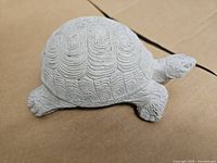 Top view of concrete turtle statue showing shell detail