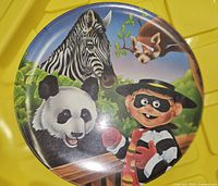 Melamine plate featuring Hamburglar with panda, zebra, red panda artwork