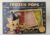 Front of boxed Frozen Pops set showing contents through window