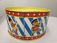 Side view showing marching band child and star border graphics