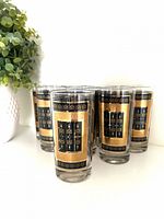 All eight highball glasses grouped together showing pattern