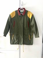 Front view showing colour blocks, pockets, drawstrings
