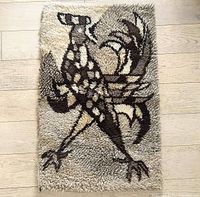 Front view of Rya rooster rug showing full design and colors