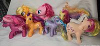 Group shot of eight My Little Pony figurines