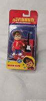 Front view of sealed Rockin' Alvin figure in blister packaging