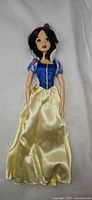 Full view of 16-inch Snow White doll in gown