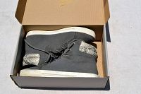 Pair of Joie tennis shoes in size 8, black-grey with white soles, placed inside an open shoebox.