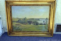 Frontal view of oil painting in gilded frame