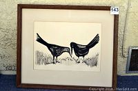 Full view of framed ink drawing featuring two stylized blackbirds interacting amid grass and wildflowers, with wooden frame and cream matting.