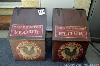 Pair of vintage wooden Red Rooster flour bins showing front labels and hinged lids