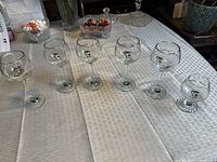 Full set of six Petro-Canada Olympic glasses on table