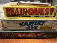 Stacked view of BrainQuest, Scavenger Hunt Safari, Sharp Shooters boxes