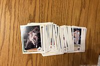 Stack of loose 1991 Upper Deck baseball cards spread on table