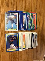 Stacks of Score baseball cards with Nolan Ryan and Dave Justice visible