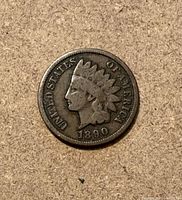 Obverse showing Liberty with feathered headdress, date 1890, UNITED STATES OF AMERICA legend