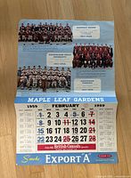 Front of calendar page showing team photos, calendar grid, Export "A" branding