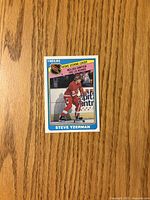 Front of Steve Yzerman Rookie Scoring Leader card showing image, borders and text