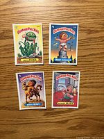 Four Garbage Pail Kids fronts