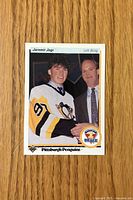 Front of Jaromir Jagr Upper Deck rookie card showing image, team name and draft logo