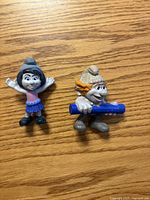 Front view of both figurines