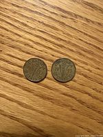 Two 1943 Canadian tombac nickels reverse side showing Victory V design