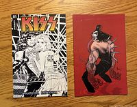 Front covers of both KISS comic books
