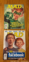 Front covers of both MAD magazines