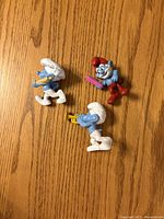 All three Smurf figurines front view