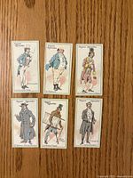 Fronts of six 1923 John Player Characters From Dickens cigarette cards