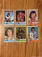 Fronts of six 1974-75 O-Pee-Chee hockey cards